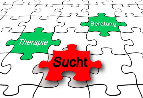 Puzzle mit Beschriftung Sucht Beratung Therapie